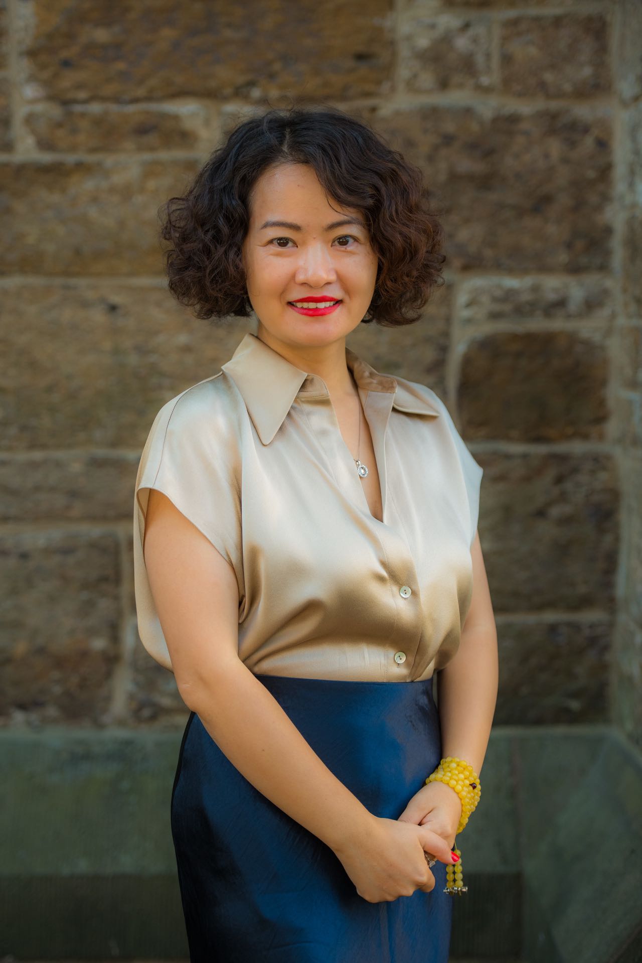 Apple Li — Founder & Director